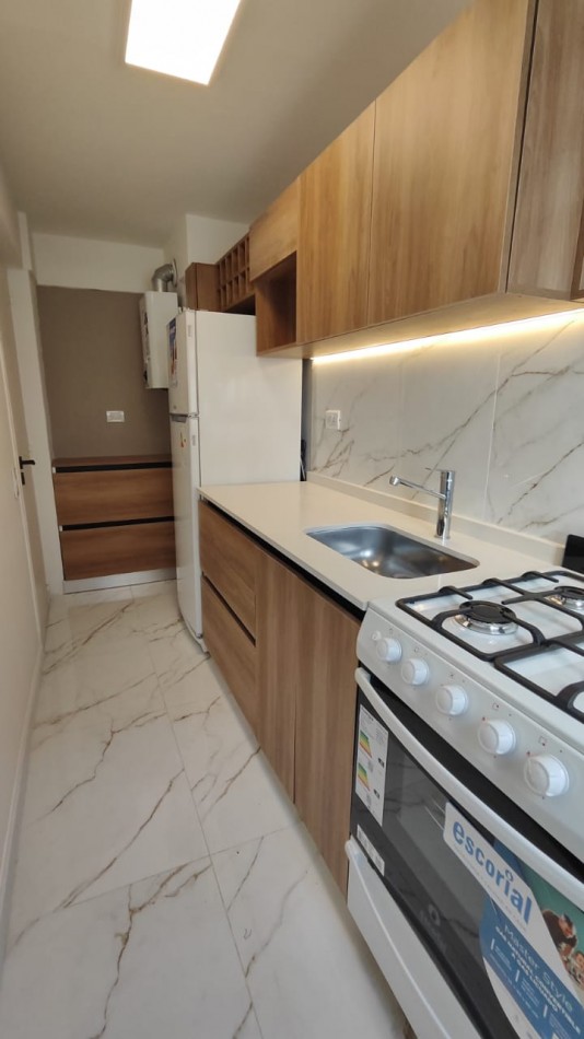 VENTA 3 AMBIENTES CON BALCON Y COCHERA-CENTRO-
