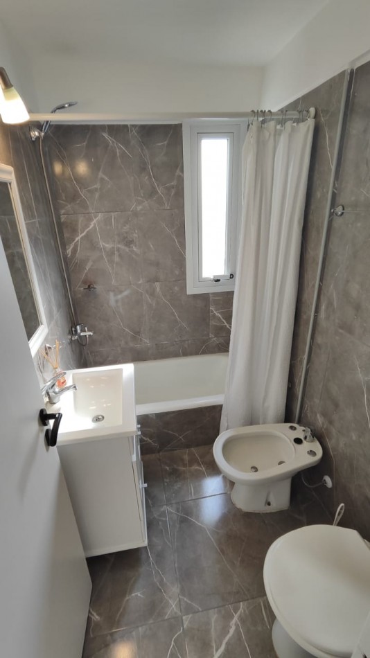 VENTA 3 AMBIENTES CON BALCON Y COCHERA-CENTRO-