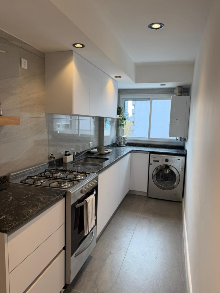 VENTA 4 AMBIENTES CON BALCON Y COCHERA - CENTRO -